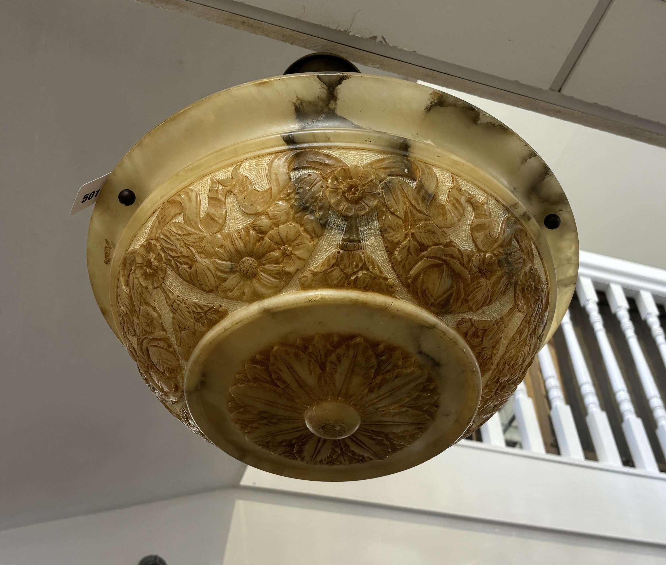 An early 20th century sculpted alabaster and brass plafonnier with four lamp fittings, diameter 46cm